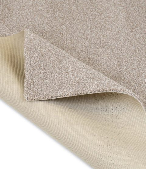 Soft Beige carpet, corner turned back to show the backing