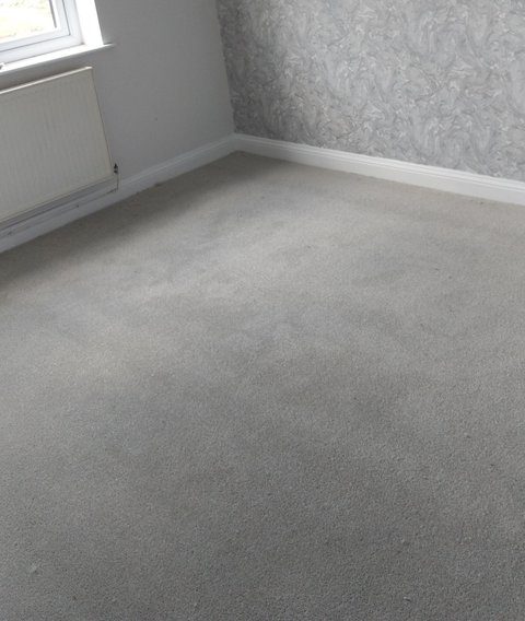 Bedroom fitted in light grey carpet
