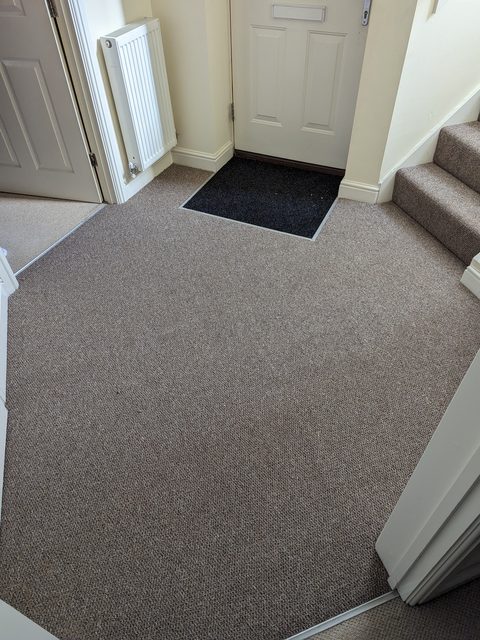 Front hallway carpet and inset door mat fitted by LG Flooring