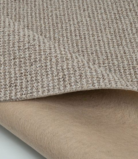 Light Beige Loop carpet, corner turned back to show the backing