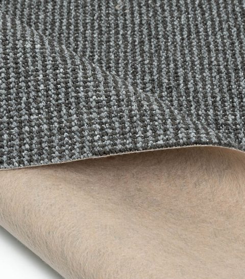 Anthracite Loop carpet, corner turned back to show the backing