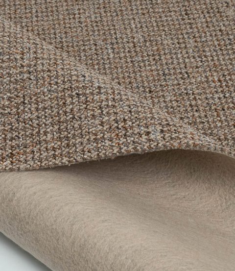 Cognac Loop carpet, corner turned back to show the backing