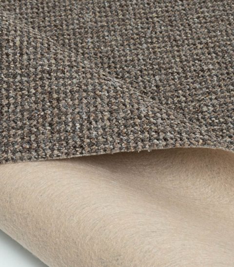 Tobacco Loop carpet, corner turned back to show the backing