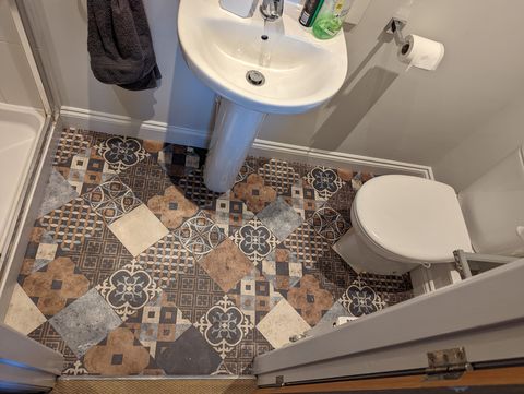 Patchwork pattern vinyl round the pedestal and toilet