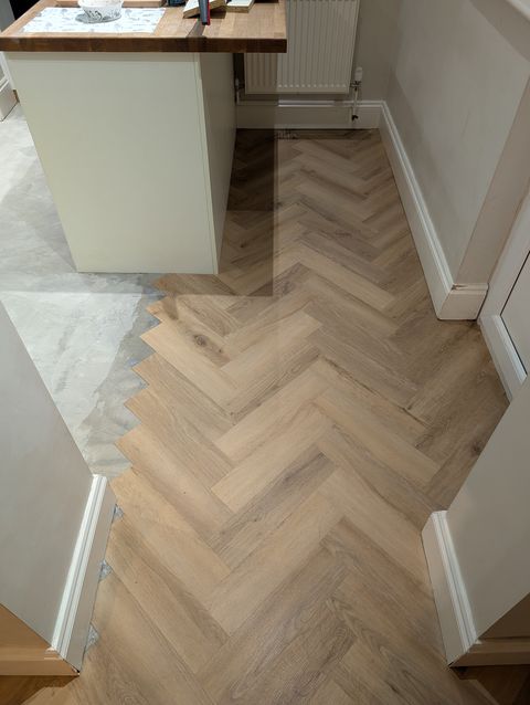 Light oak herringbone LVT, hallway
