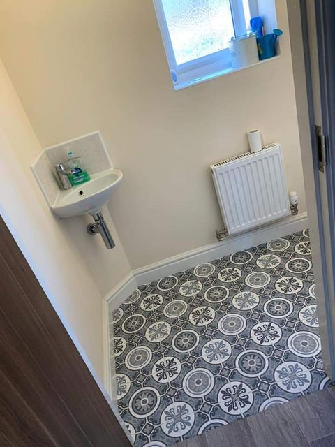 Patterned vinyl, downstairs toilet