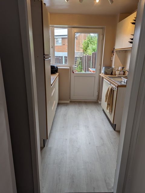 Whitewashed oak plank LVT, galley kitchen