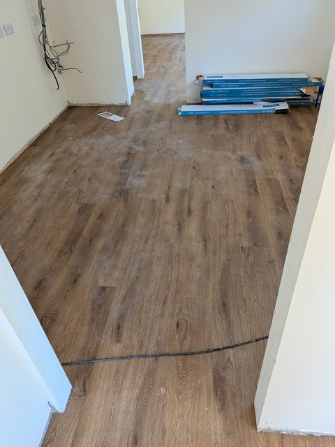 Hallway through to the office rooms, fitted in glue-down LVT by LG Flooring